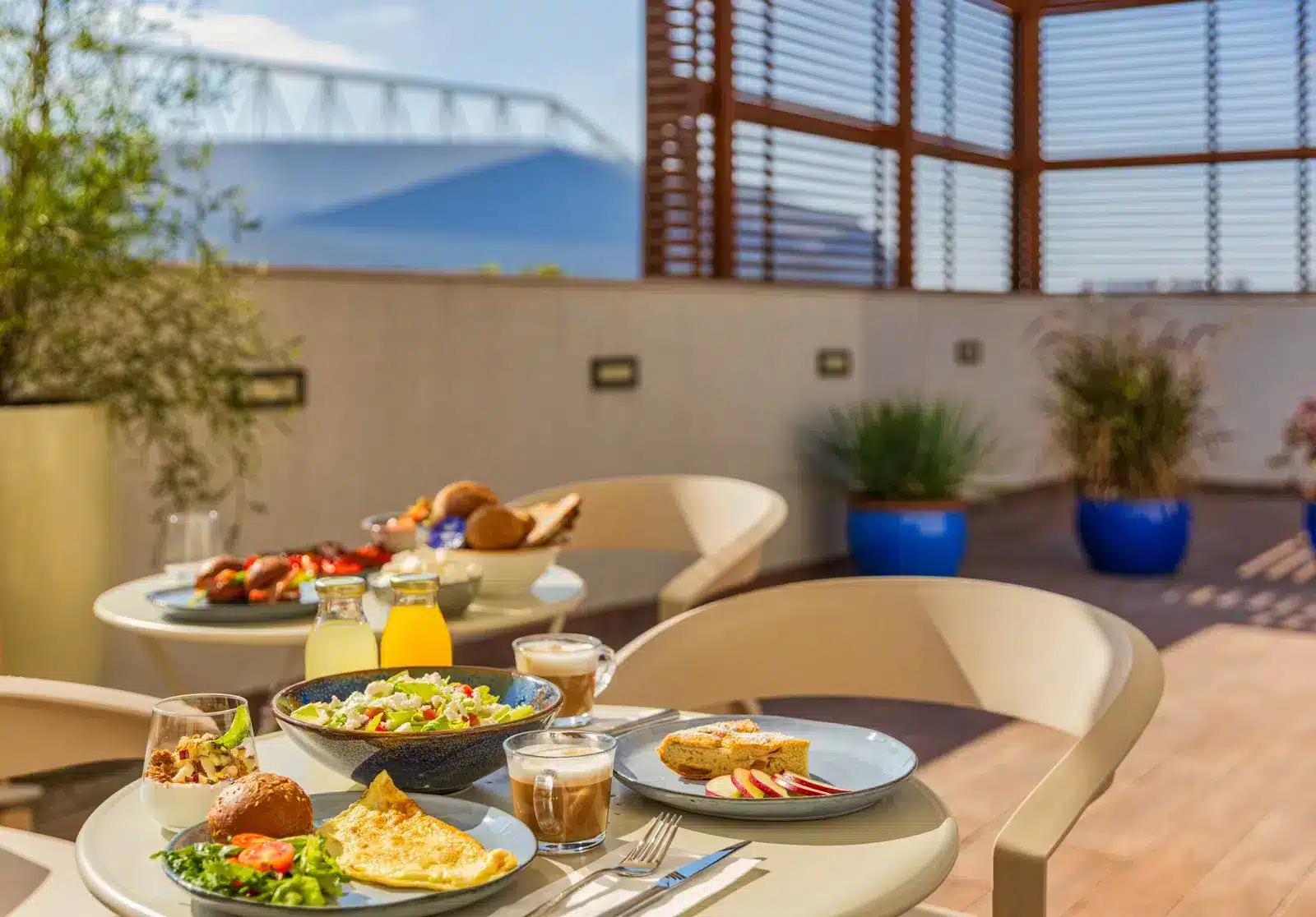 Rooftop breakfast with a sea view at Abba Hotel