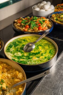Hot dishes on the Abba Hotel breakfast buffet shakshuka scrambled eggs and pasta