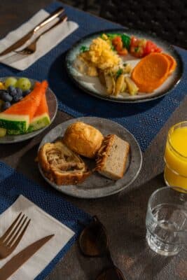 Breakfast served at Abba Hotel Tel Aviv eggs vegetables pastries watermelon and orange juice
