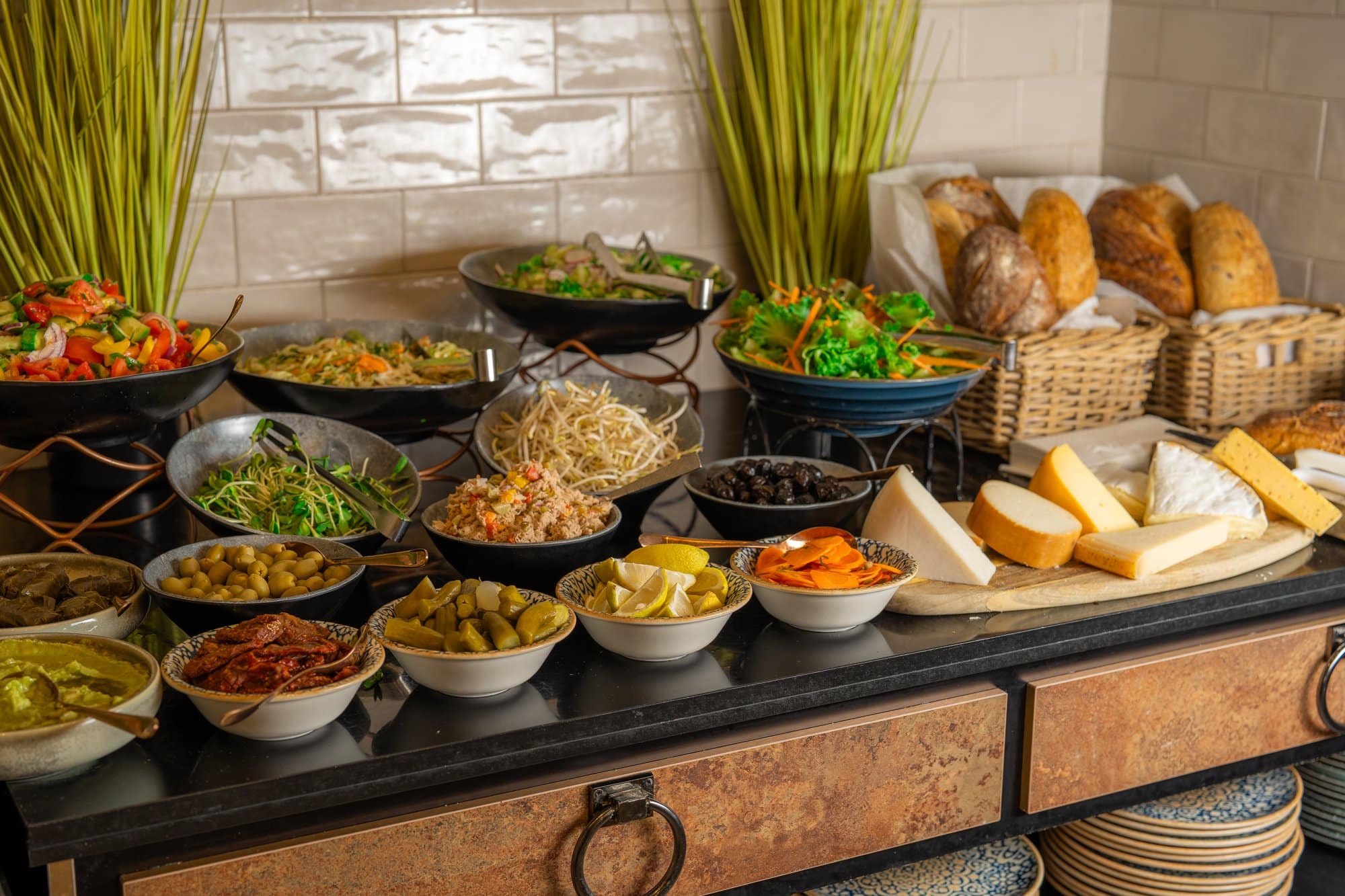 Israeli breakfast buffet at Abba Hotel with salads olives pickles spreads cheeses and breads